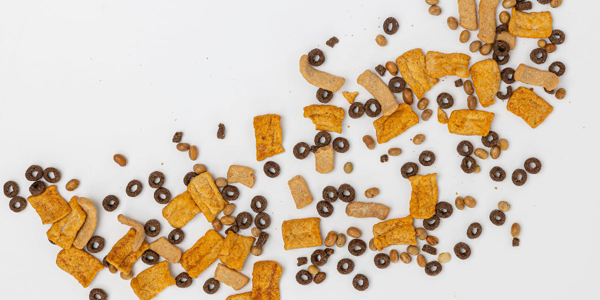 Assorted cereal pieces on a white background