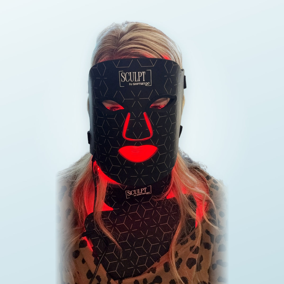 RLT mask in use, face and neck lit red
